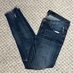 Distressed dark wash skinny jeans. Size 27. Like new!